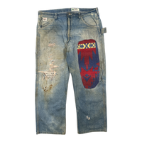 Big patch repaired carpenter denim